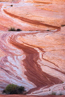A ribbon of red sandstone cuts through whitish sandstone in Valley of Fire state park in Nevada