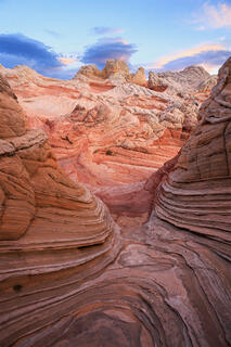 The white rocks of white pocket and mingled with striped rocks and swirls of color.