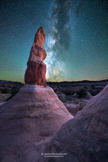 A large hoodoo photographed at night in Devils Garden, Escalante National Monument with the milky way in the background