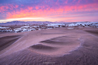 Frozen sand dunes in the Little Sahara at sunrise