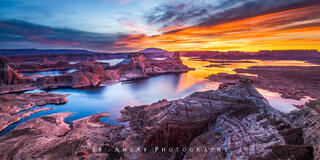 Padre Bay and gunsight butte of Lake Powell make dramatic centerpieces as the sun rises. 