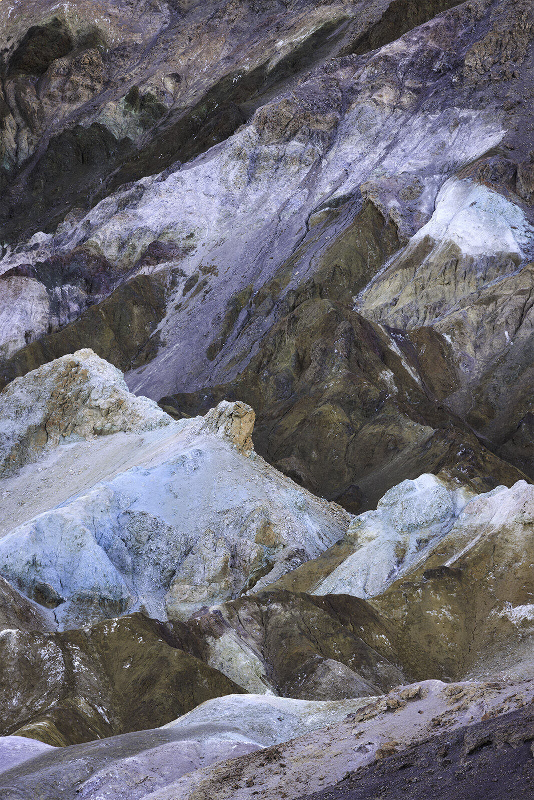 Artist Pallet The chaotic soil collides with each other revealing a swirl of browns, whites, grey, blue, reds and more.