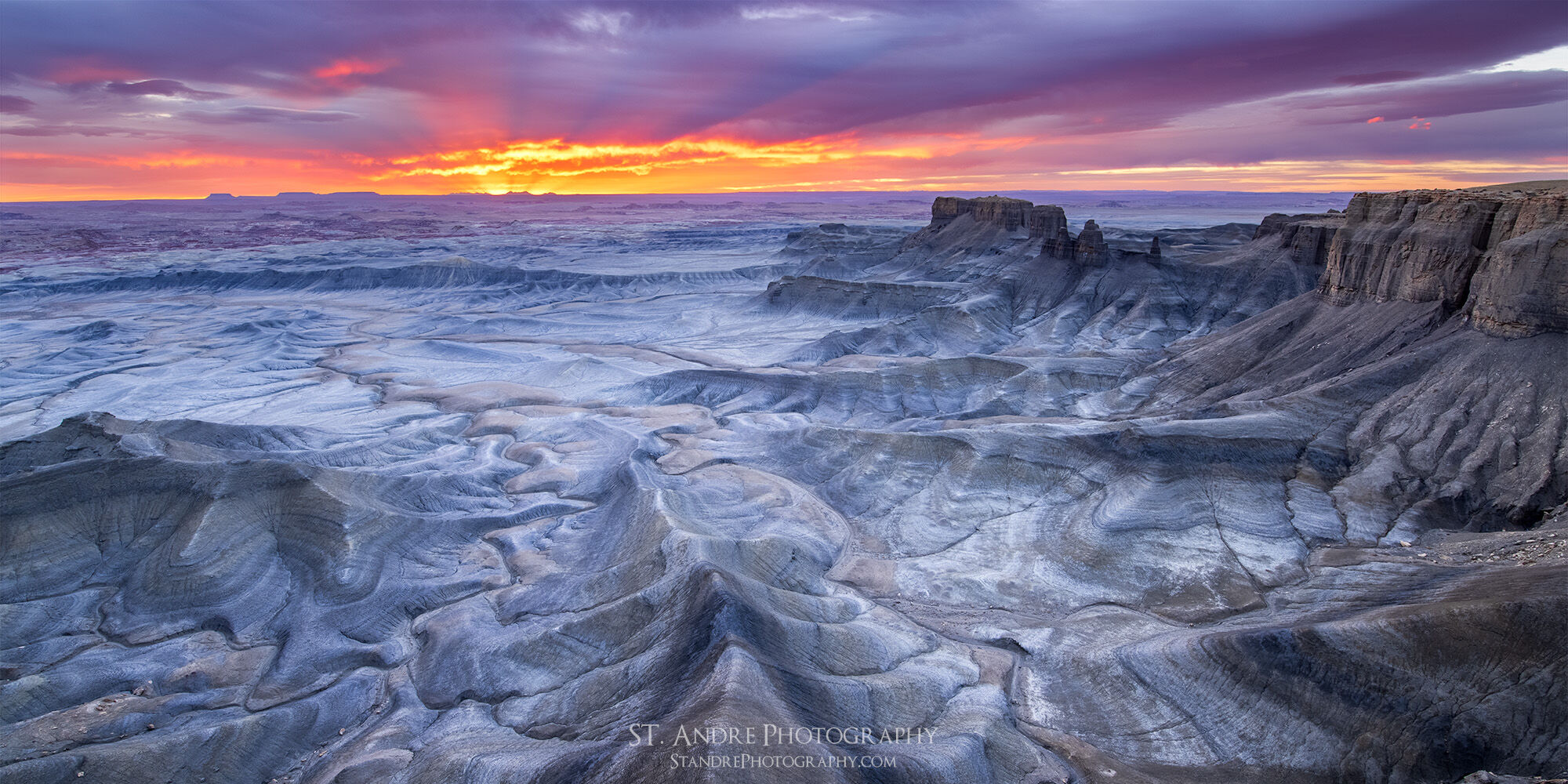 Lunar Sunrise The badlands of Hanksville, Utah near the San Rafael Swell.