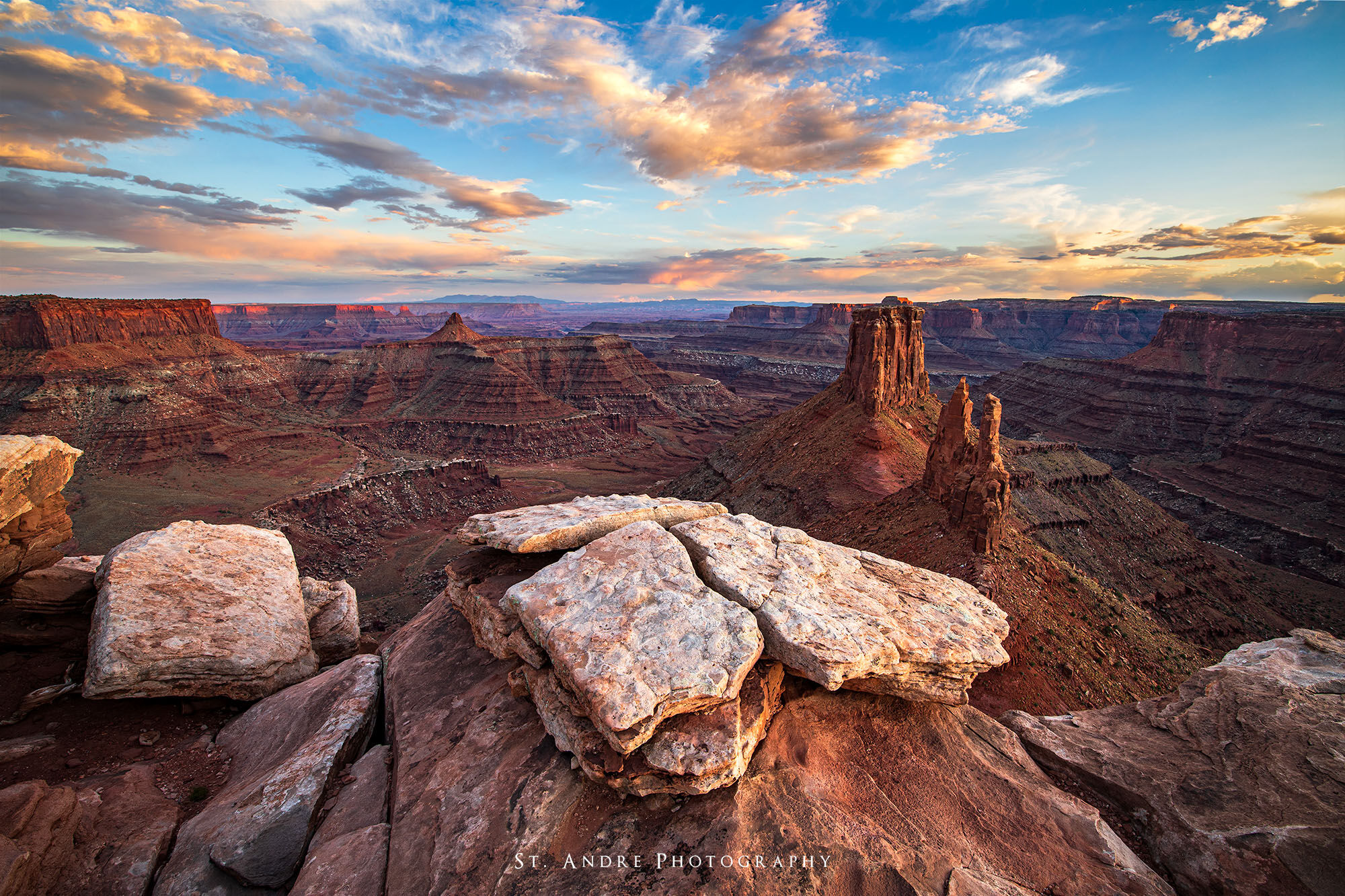 Malboro point in moab utah. A large tower stands in a canyon at sunset near moab utah