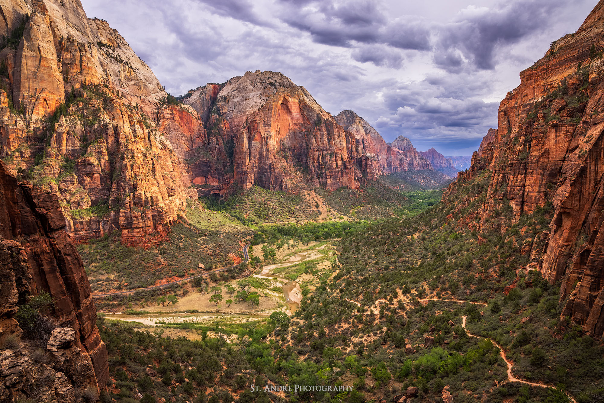 A view looking down Zion Canyon with Red Arch Mountain, Temple of the Sun, Two Brothers and the Watchman in view.