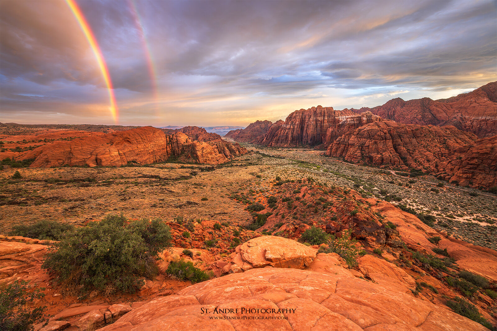 A double rainbow archs over Snow Canyon State Park. 