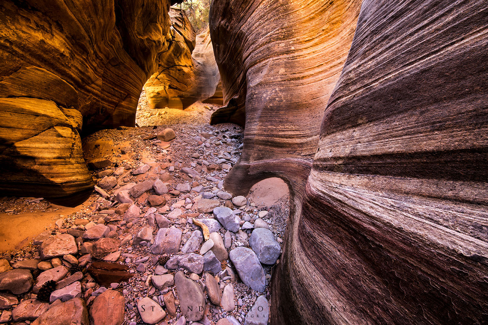 A small Natural bridge in Zion that forms an arch over a stream bed. 