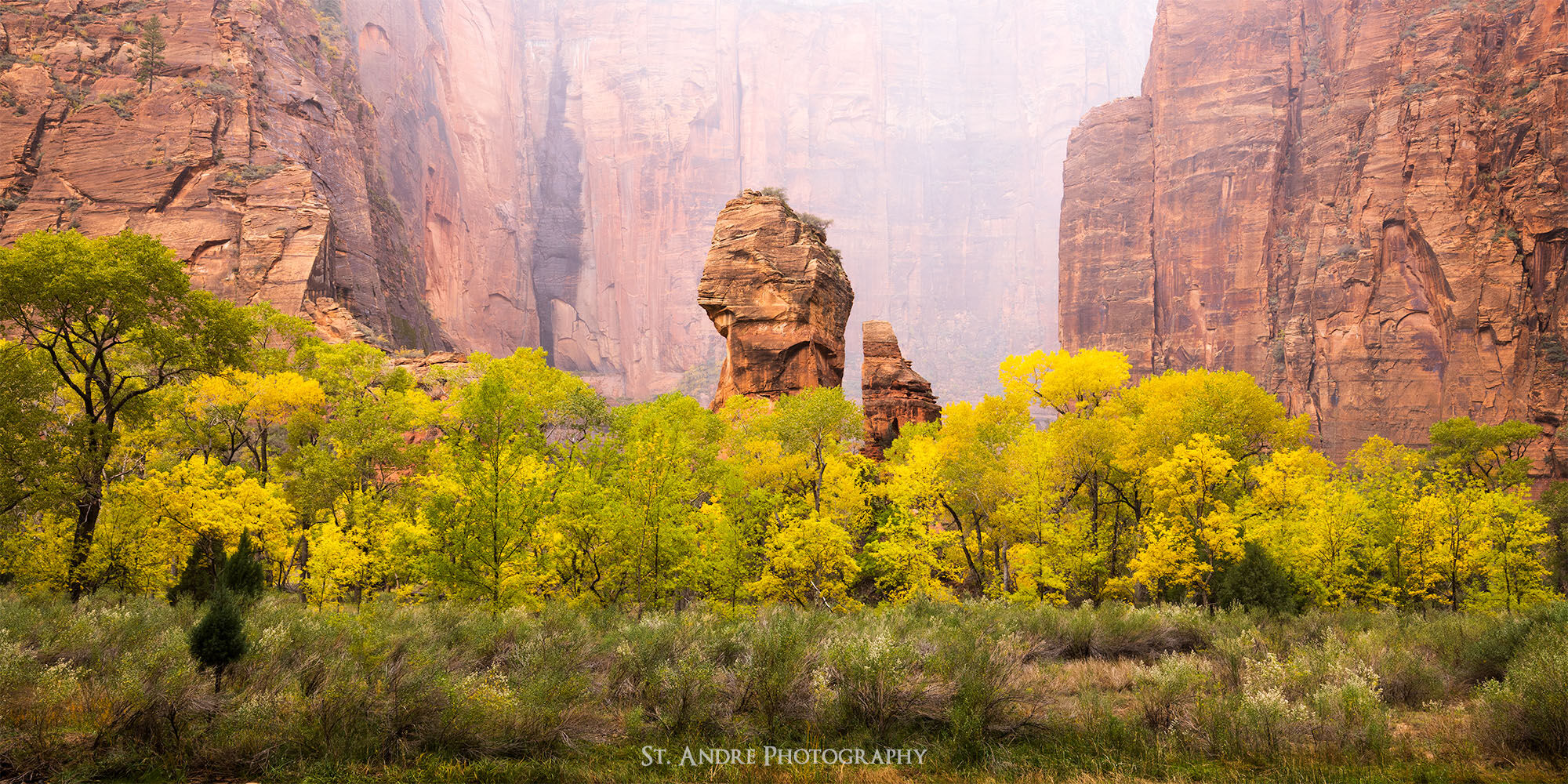Temple of Sinawava in Zion with fall colors backdropped by snow
