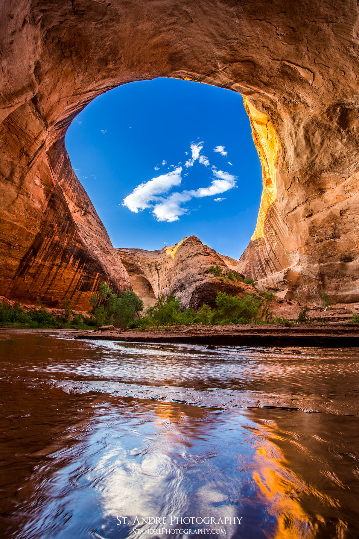 A large alcove that wraps around jacob hamblin arch in escalante's Coyote Gulch.