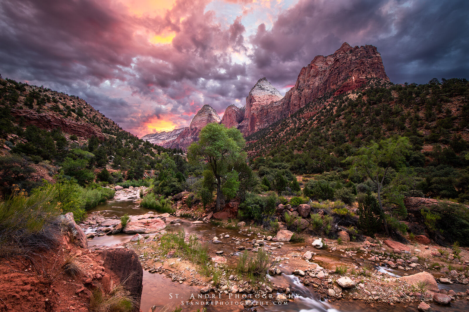 Dramatic peaks in Zion national Park with a monsoon storm brewing. Peaks highlighted are the two brothers, Temple of the Sun and the east temple in Zion. 