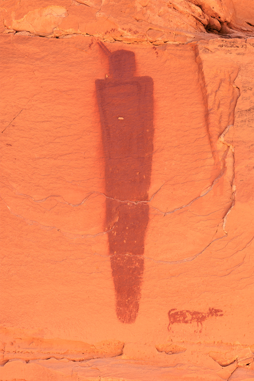 Warrior Pair A large petroglyph of a warrior and his pet dog