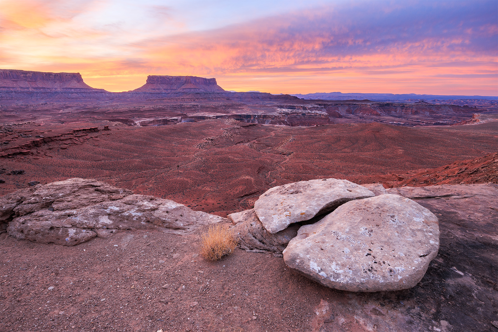 Yin and Yang A wonderfully broken in half rock with an epic sunrise going on in the distance.